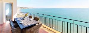 A balcony or terrace at Olimpo - Fuengirola Beachfront Newly Renovated Apartment