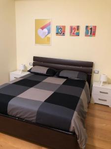 A bed or beds in a room at FORT. Montagna A305