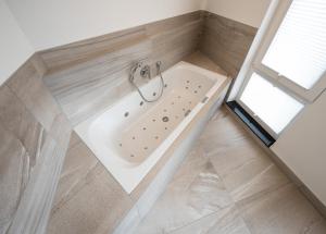 Ein Badezimmer in der Unterkunft RS-HOTEL - smart & modern Hotel Apartments
