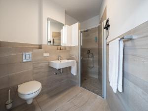 Ein Badezimmer in der Unterkunft RS-HOTEL - smart & modern Hotel Apartments