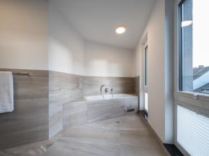 Ein Bett oder Betten in einem Zimmer der Unterkunft RS-HOTEL - smart & modern Hotel Apartments