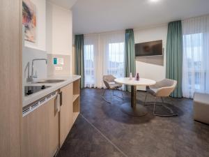 Küche/Küchenzeile in der Unterkunft RS-HOTEL - smart & modern Hotel Apartments