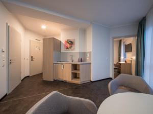 Küche/Küchenzeile in der Unterkunft RS-HOTEL - smart & modern Hotel Apartments