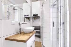 Ванная комната в Toress Apartamenty Kaskada