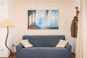 A seating area at Appartamento Vicino al Mare