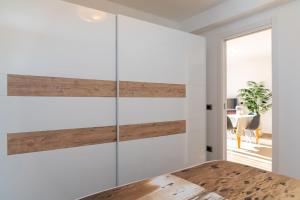 A bed or beds in a room at Appartamento Vicino al Mare