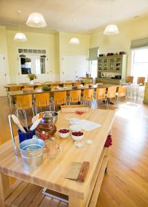 a large kitchen with a wooden table and chairs at Cavallo Point in Sausalito