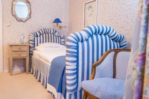 Posteľ alebo postele v izbe v ubytovaní Hotel Edelweiss