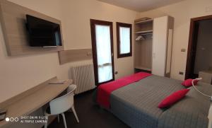 Postel nebo postele na pokoji v ubytování Hotel Del Negro