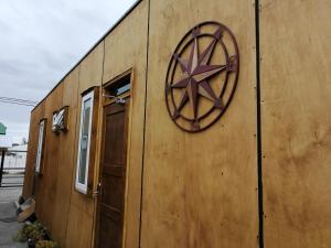 a building with a star sign on the side of it at Espacio Innata in Punta Arenas
