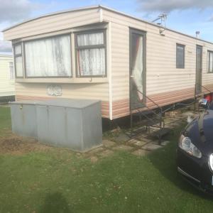 a mobile home being built with the door open at Caravan to Hire Dymchurch in Dymchurch