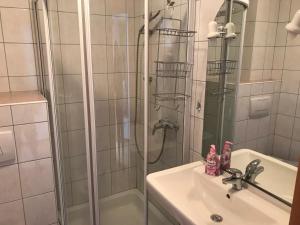 Ванна кімната в Appartement Rettensteiner