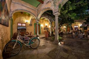 a couple of bikes parked in a building at Casa De Sierra Azul in Oaxaca City