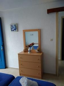 Postel nebo postele na pokoji v ubytování Ariadne Studios