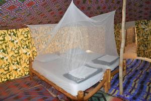 AFRICA ROOTS DESERTにあるベッド
