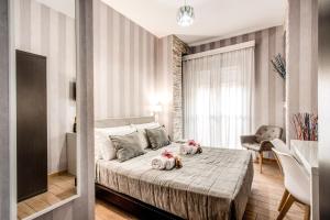 Posteľ alebo postele v izbe v ubytovaní Santamaggiore