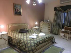 Voodi või voodid majutusasutuse D'Ambrogio Guest House toas