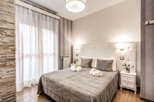Posteľ alebo postele v izbe v ubytovaní Santamaggiore