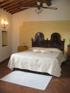 Postel nebo postele na pokoji v ubytování B&B Antiche Rime