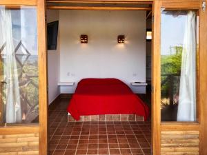 Postel nebo postele na pokoji v ubytování Hotel Casa Vichayo