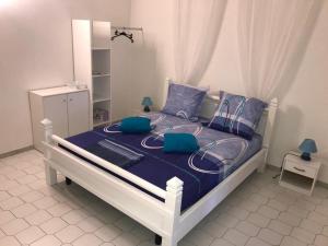 Ένα ή περισσότερα κρεβάτια σε δωμάτιο στο Villa Paradis Ultime