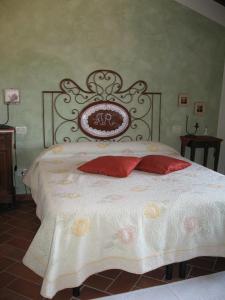 Postel nebo postele na pokoji v ubytování B&B Antiche Rime