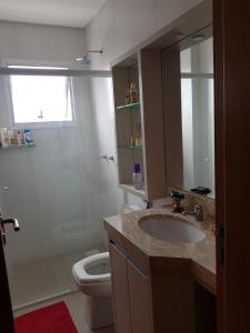 Koupelna v ubytování Vista parcial para o mar