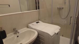 Kúpeľňa v ubytovaní Apartamenty nad Stonehenge