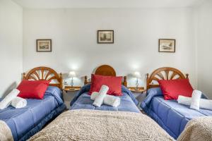 Llit o llits en una habitació de Alojamiento en Casco Antiguo de Cordoba