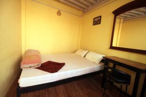 Ένα ή περισσότερα κρεβάτια σε δωμάτιο στο Beehive Hostel Kathmandu