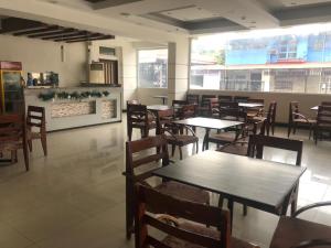 Kuchyň nebo kuchyňský kout v ubytování Negrense Suites