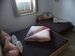 Ein Bett oder Betten in einem Zimmer der Unterkunft Ferienwohnung Hotter