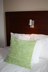 Cama o camas de una habitación en First Hotel Jörgen Kock