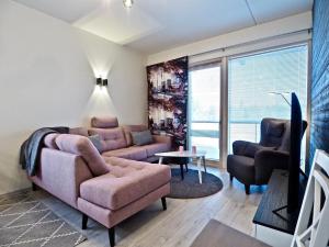 Posezení v ubytování Levillas Tunturinlaita Apartments