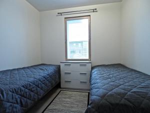 Postel nebo postele na pokoji v ubytování Levillas Tunturinlaita Apartments
