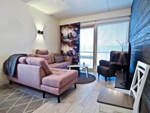 Posezení v ubytování Levillas Tunturinlaita Apartments