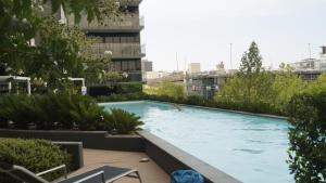 a swimming pool on the roof of a building at Manhattan on Glebe Park in Canberra