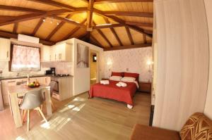 Kuchyň nebo kuchyňský kout v ubytování San George Apartments