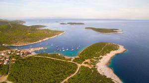 an aerial view of a bay with boats in the water at The Sea House Apartments in Vis