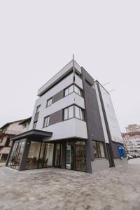 a tall building with a lot of windows at Hotel Tanja in Banja Luka