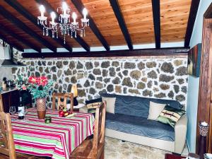 Posezení v ubytování Ermones Emerald Villa