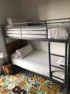 a couple of bunk beds in a room at Pigal in Tarragona