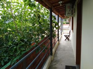 Een balkon of terras bij Cafe Preto Pousada e Bistrô