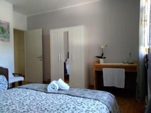 Postel nebo postele na pokoji v ubytování Home Meditamondo