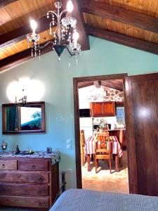 A television and/or entertainment centre at Ermones Emerald Villa