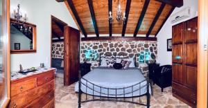 A bed or beds in a room at Ermones Emerald Villa Még 27 kép