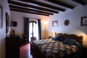 Posteľ alebo postele v izbe v ubytovaní Petit Hotel Ses Rotges - Only Adults