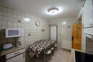 Kuchyň nebo kuchyňský kout v ubytování CASA TENA + 11 fotografií