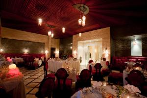 Restoranas ar kita vieta pavalgyti apgyvendinimo įstaigoje Palm Plaza Hôtel & Spa