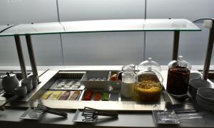 a kitchen with some food on a counter at 4- you Family in Metamorfosi